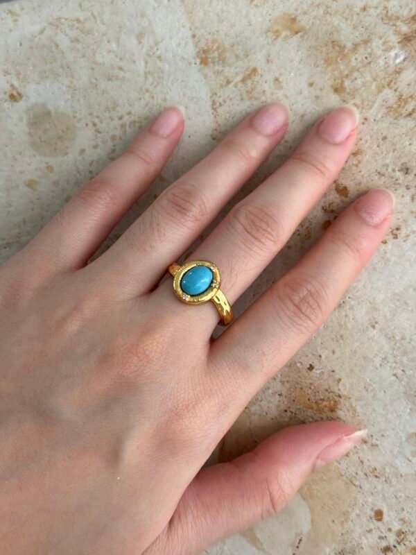Blue Oval Stone Gold Ring